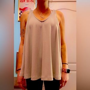 Beige tank top from upscale boutique.